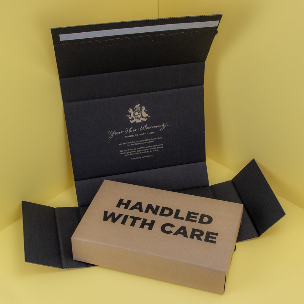 Handled with care corrugated wrap box